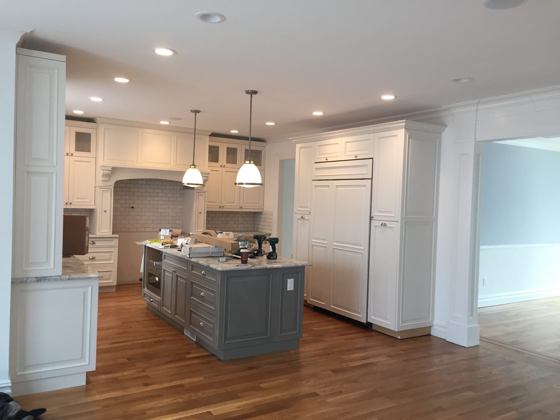 Classic white shaker for an Astoria rowhouse — Green Cabinets NY, custom cabinetry in Astoria, Queens