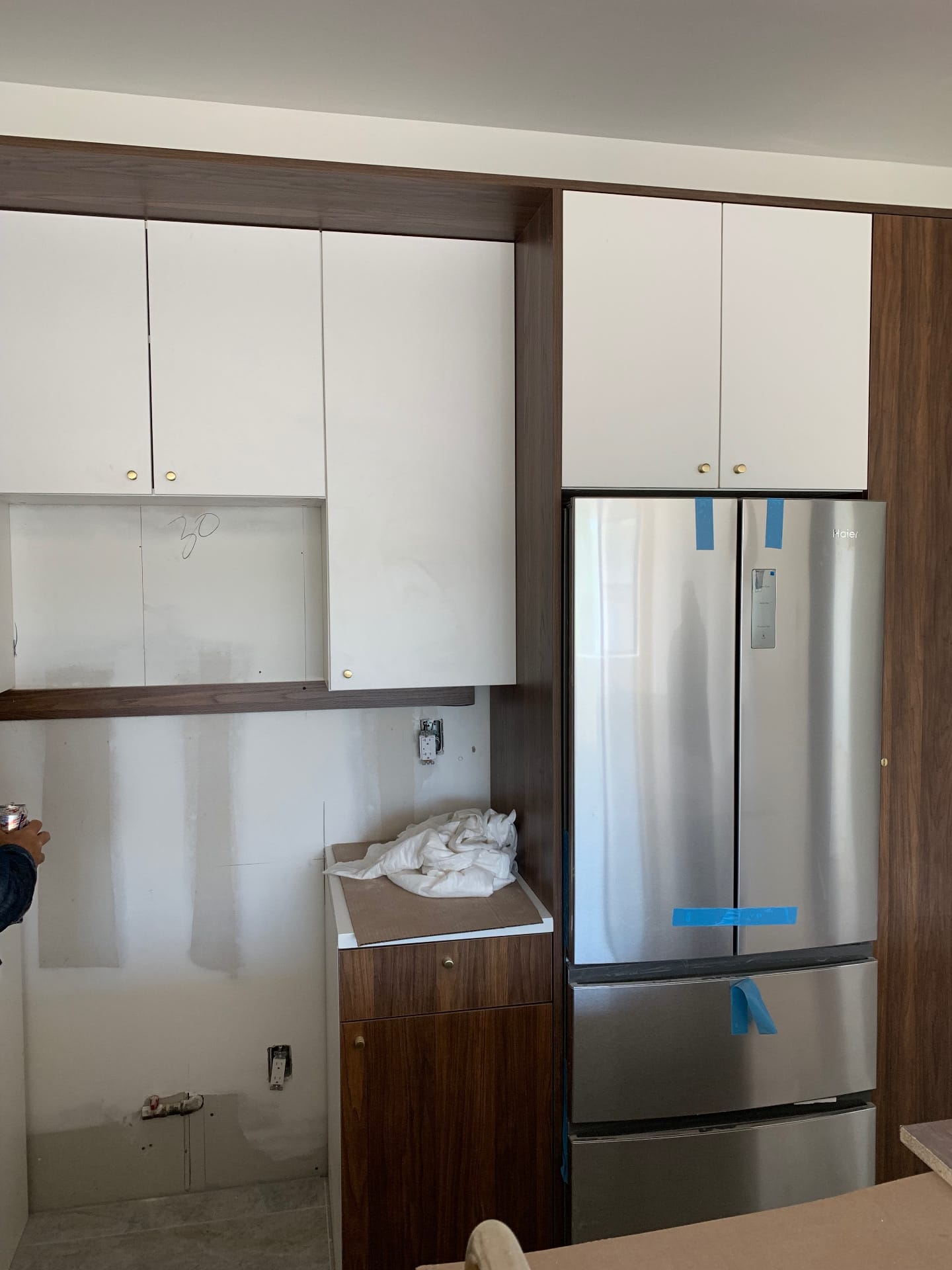 Two-tone cabinetry mid-install, ready for delivery — Green Cabinets NY, custom cabinetry in Bushwick, Brooklyn