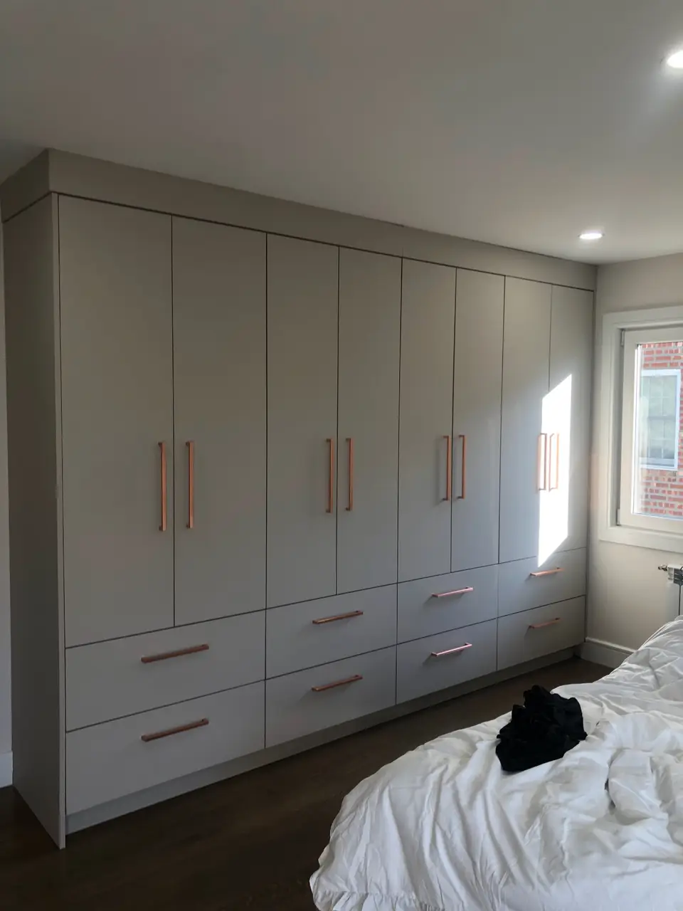 Custom gray bedroom built-in closet