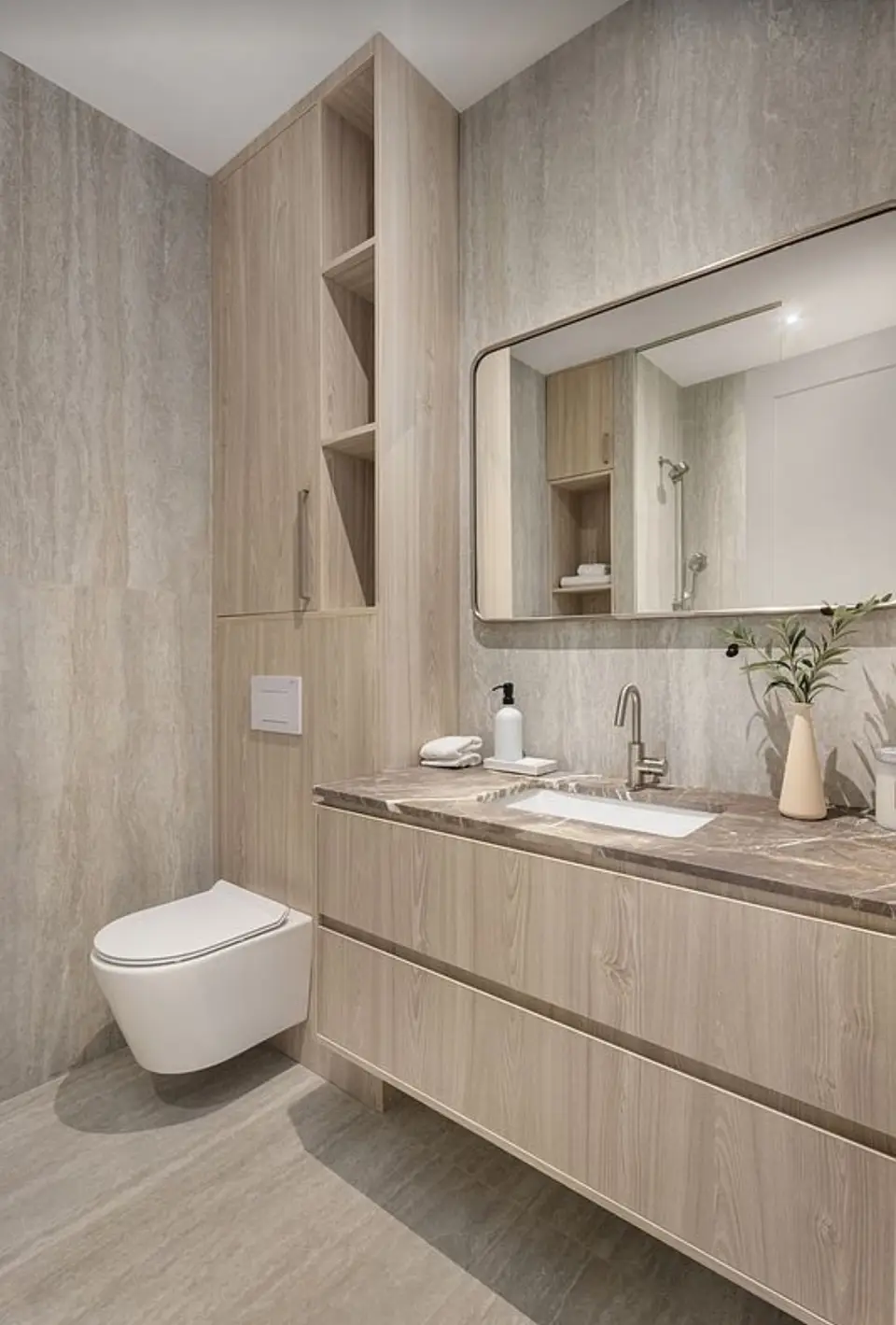 Contemporary powder room with wood vanity and marble countertop
