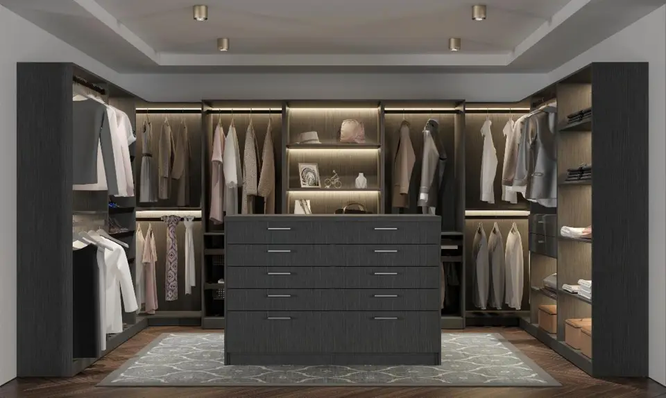 Dark wood walk-in closet with center island and extensive storage