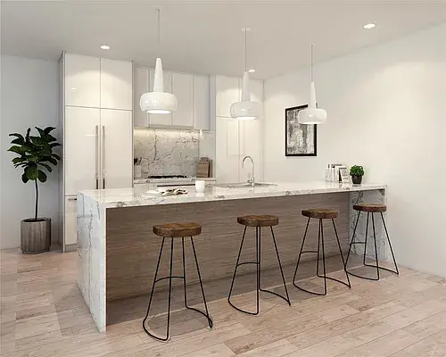 Modern kitchen with marble waterfall island and natural wood base