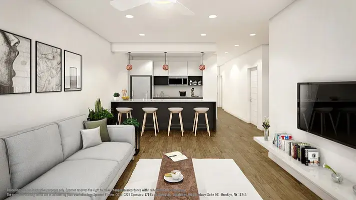 Open concept living area with black kitchen island and copper pendant lights