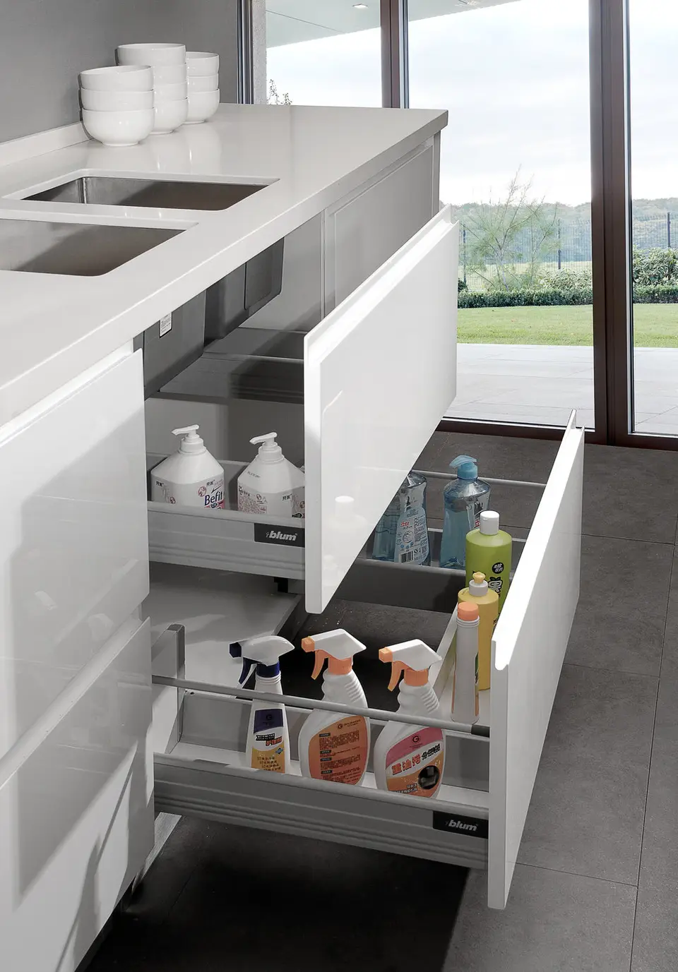 White kitchen with multi-level drawer storage organization