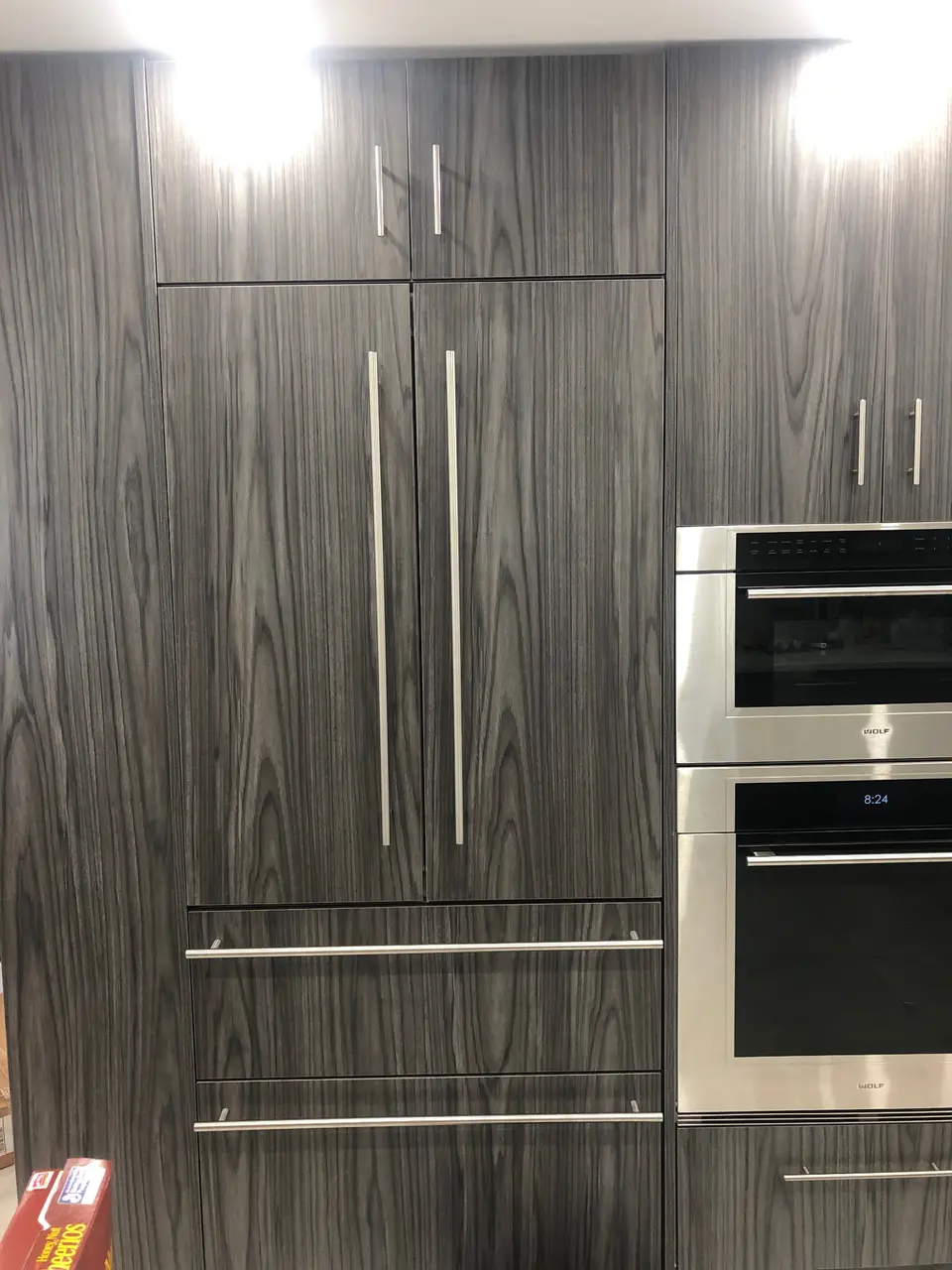 White kitchen island with custom cabinet installation