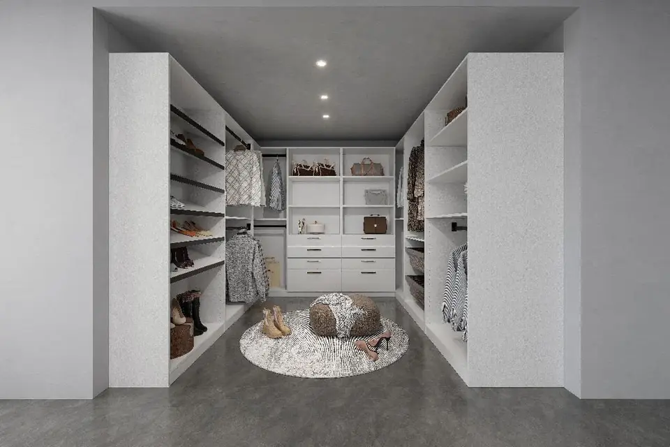 Modern white walk-in closet with minimalist design